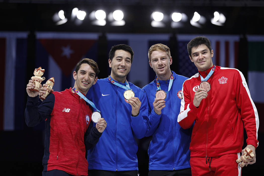 From left, silver medalist Chile's Gustavo Alarcon, gold medalist Gerek Meinhardt of the U.S., ...
