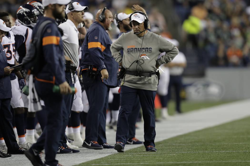 Denver Broncos head coach Vic Fangio stands on the sideline during the second half of an NFL fo ...