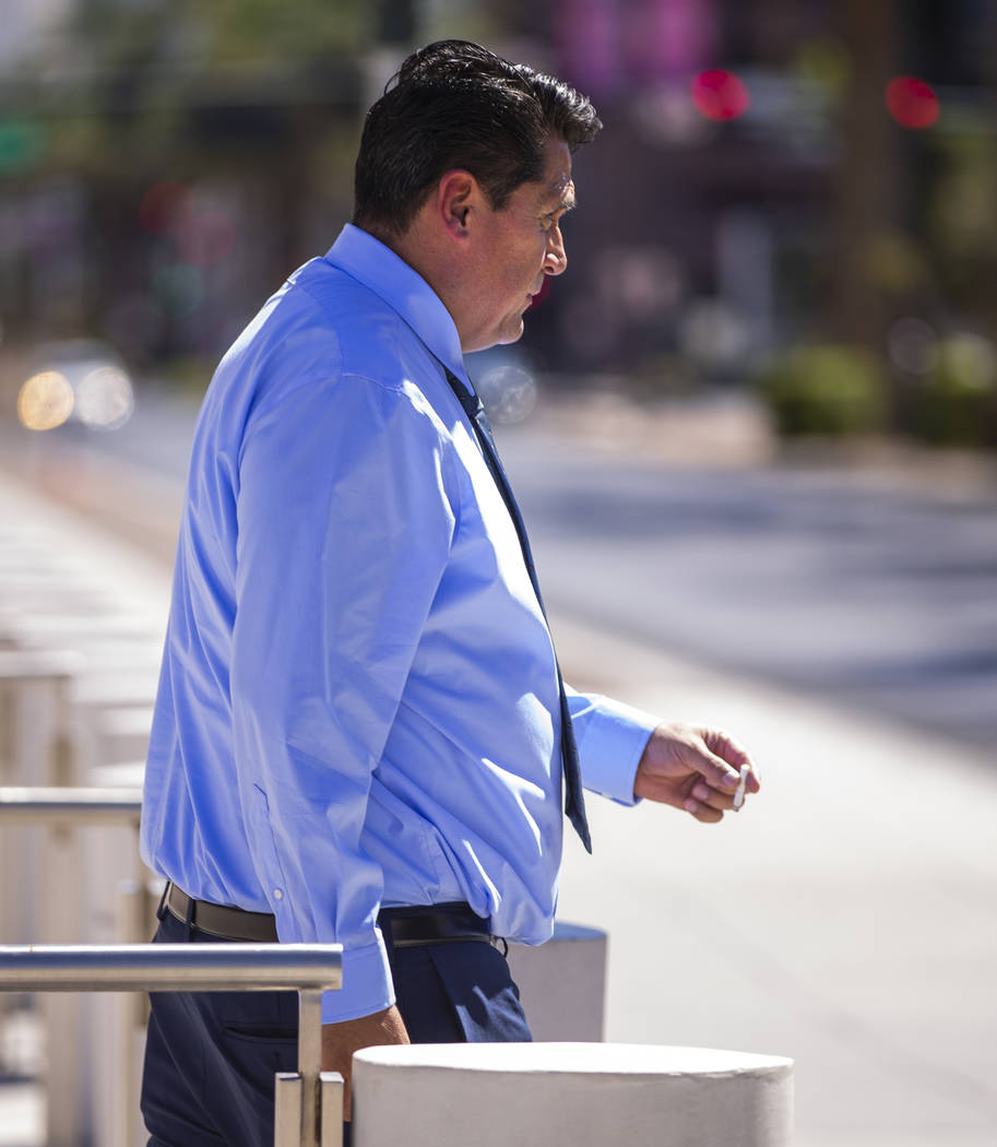 Defendant Bradley Campos departs the Lloyd D. George Courthouse following opening statements in ...