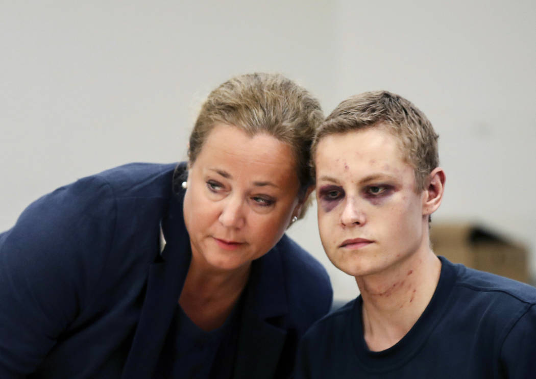 Suspect gunman Philip Manshaus, right and his lawyer Unni Fries attend a court hearing, in Oslo ...