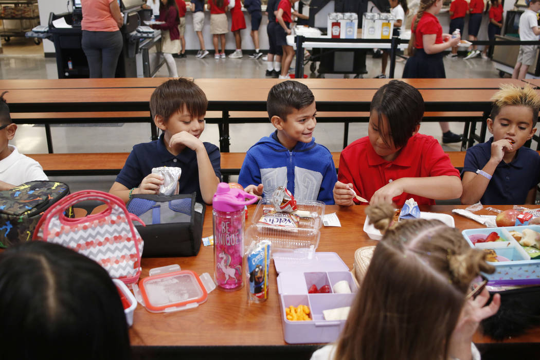 Legacy Traditional School students eat lunch during the opening week of the southwest Las Vegas ...