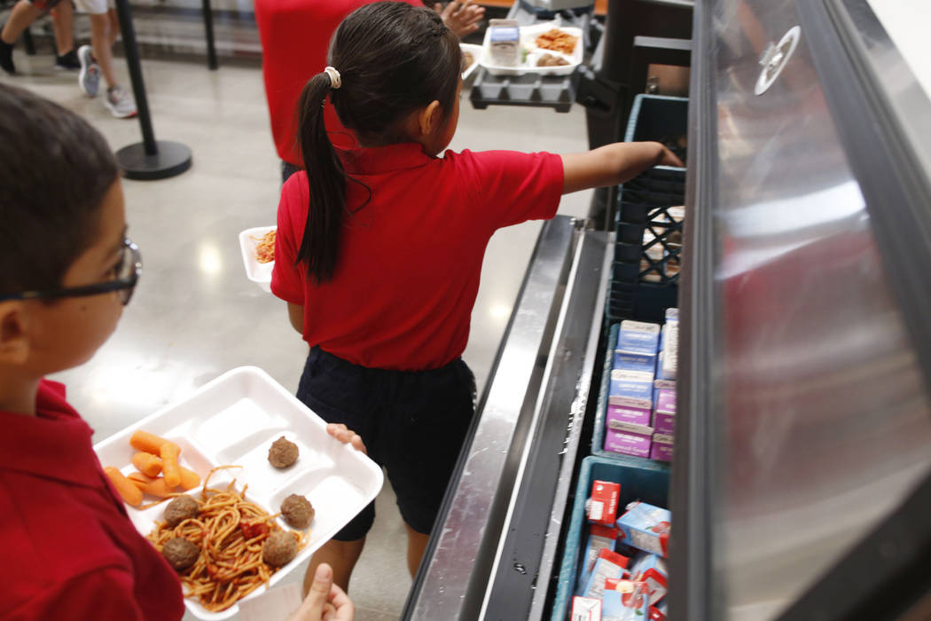 Legacy Traditional School students have lunch during the opening week of the southwest Las Vega ...