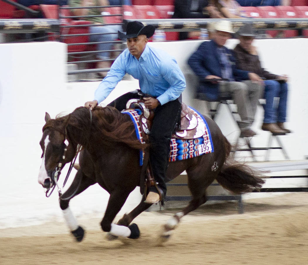 Reining expert Matt Mills practices his reining pattern at the South Point Arena in Las Vegas o ...