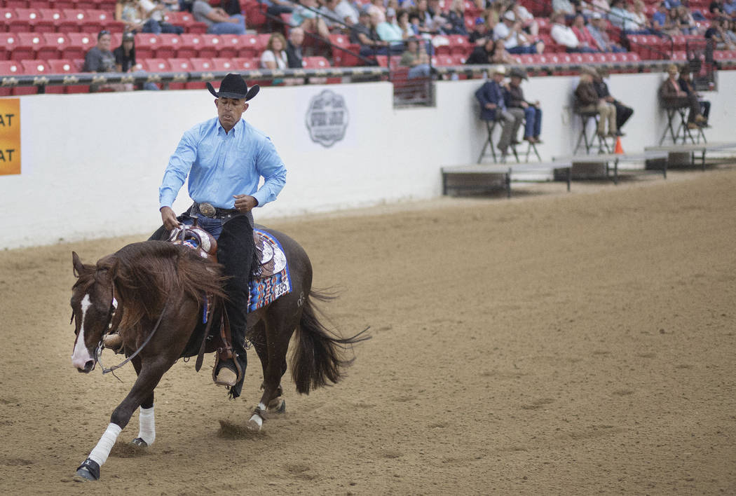 Reining expert Matt Mills practices his reining pattern at the South Point Arena in Las Vegas o ...