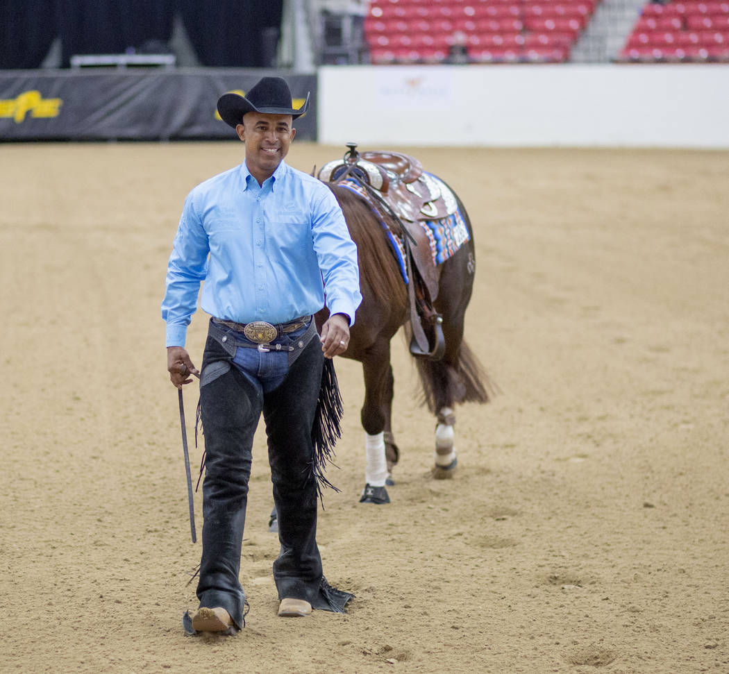 Reining expert Matt Mills finishes practicing his reining pattern at the South Point Arena in L ...