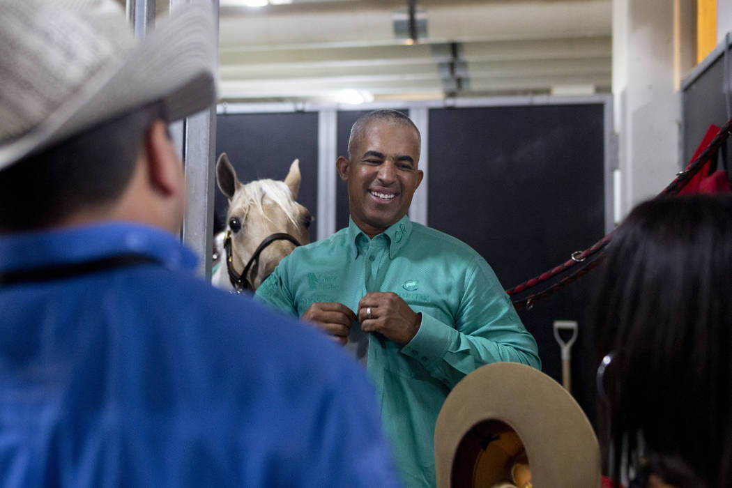 Reining expert Matt Mills finishes practicing his reining pattern at the South Point Arena in L ...