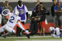 UNLV Rebels wide receiver Tyleek Collins (9) runs the ball against coverage from Air Force Falc ...