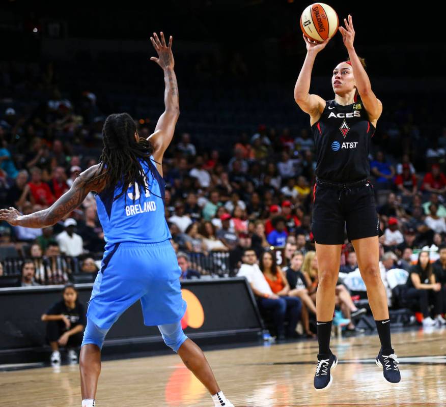 Las Vegas Aces' Dearica Hamby shoots over Atlanta Dream's Jessica Breland (51) during the secon ...