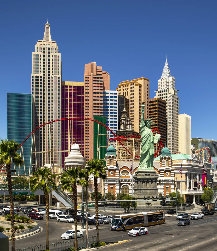 An RTC bus passes New York-New York driving down the Strip on Tuesday, Aug. 13, 2019 in Las Veg ...