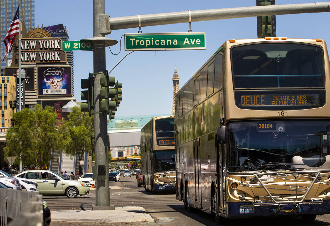 Several RTC buses pass the New York-New York driving down the Strip on Tuesday, Aug. 13, 2019 i ...