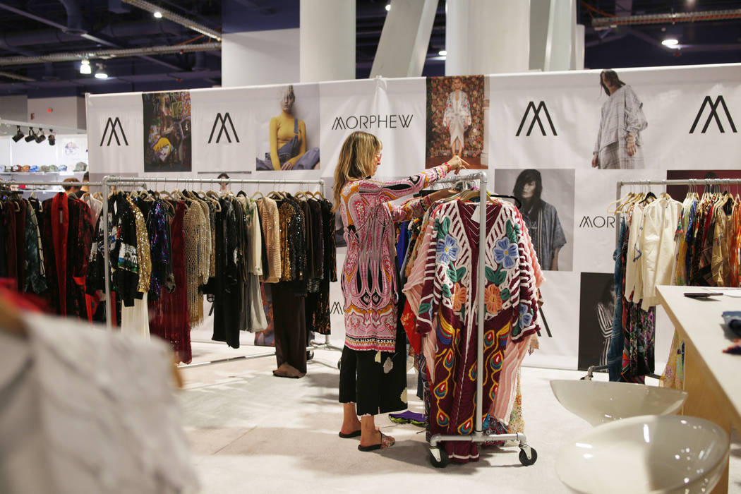 Morphew founder Bridgette Morphew sorts through Morphew pieces at her exhibit during the second ...