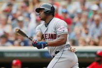 Cleveland Indians' Yasiel Puig hits an RBI double off Minnesota Twins pitcher Jose Berrios in t ...