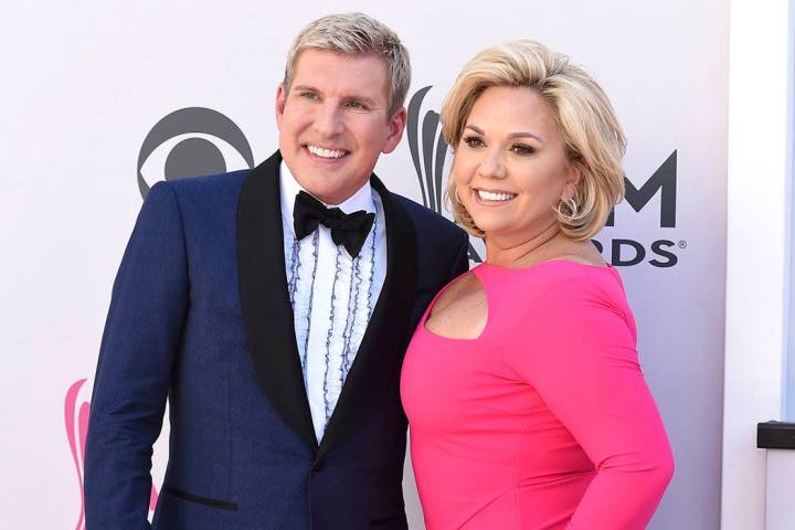 FILE-Todd Chrisley, left, and Julie Chrisley arrive at the 52nd annual Academy of Country Music ...