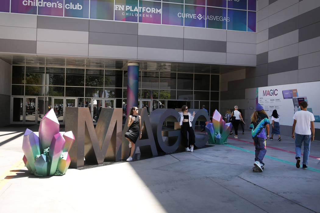 Attendees come and go during the third day of the MAGIC trade show at the Las Vegas Convention ...