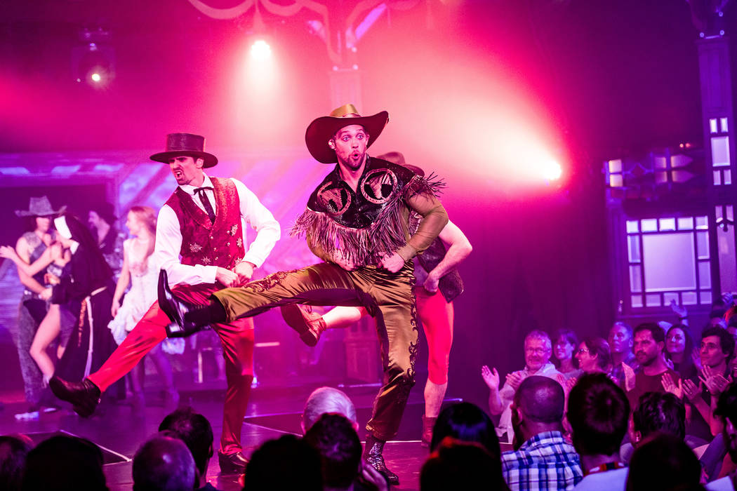 Colin Cahill leads a show-closing cowboy jig in a performance of "Atomic Saloon Show" during it ...