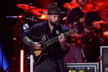 FILE - In this Wednesday, June 5, 2019 file photo Zac Brown performs at the CMT Music Awards in ...