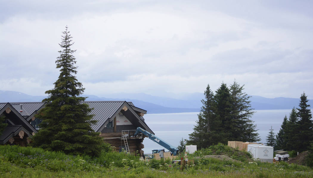 This July 9, 2019 photo shows part of country musician Zac Brown's log home, visible from Dorot ...