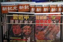 In a July 4, 2019, photo, Chinese magazines with front covers featuring Chinese President Xi Ji ...