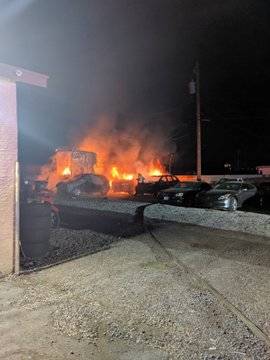 A shed and vehicles burn at B&B Auto Sales, 3800 Vegas Drive, early Thursday morning, Aug. 15, ...