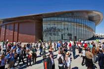 In a Oct. 17, 2011, file photo, guests stand outside the new Spaceport America hangar in Upham, ...