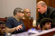 Andrew Arevalo, left, talks with criminal defense attorney Dan Gilliam before his sentencing at ...