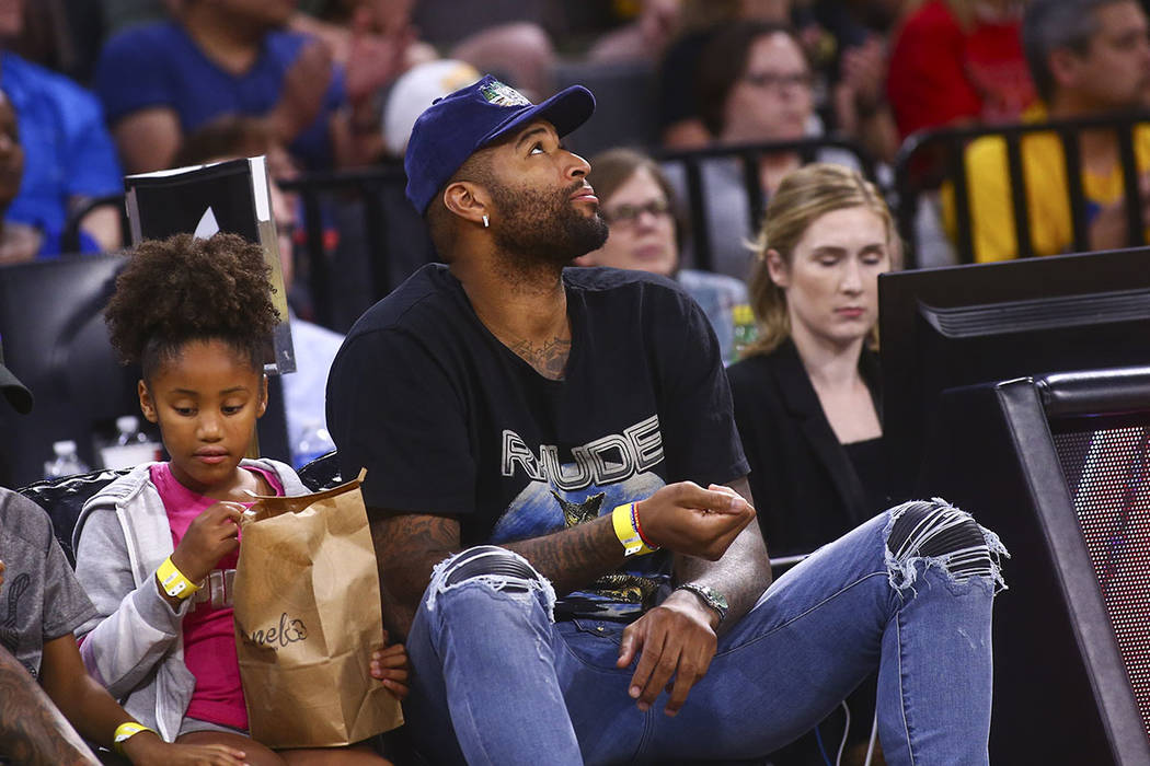 Los Angeles Lakers' DeMarcus Cousins watches the action during the second half of a WNBA basket ...