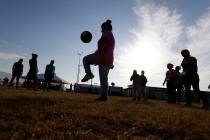 File - In this July 9, 2019, file photo, immigrants play soccer at the U.S. government's newest ...