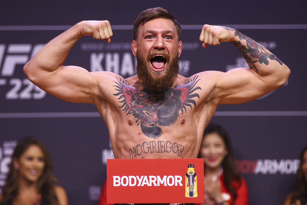 Video shows former UFC champ Conor McGregor punching  