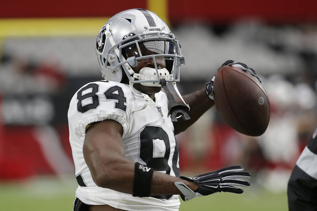 Oakland Raiders wide receiver Antonio Brown (84) warms up prior to an NFL football game against ...