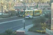 Las Vegas police respond to the scene of a crash at South Grand Central Parkway and West Bonnev ...