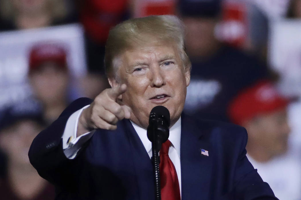 President Donald Trump speaks at a campaign rally, Thursday, Aug. 15, 2019, in Manchester, N.H. ...