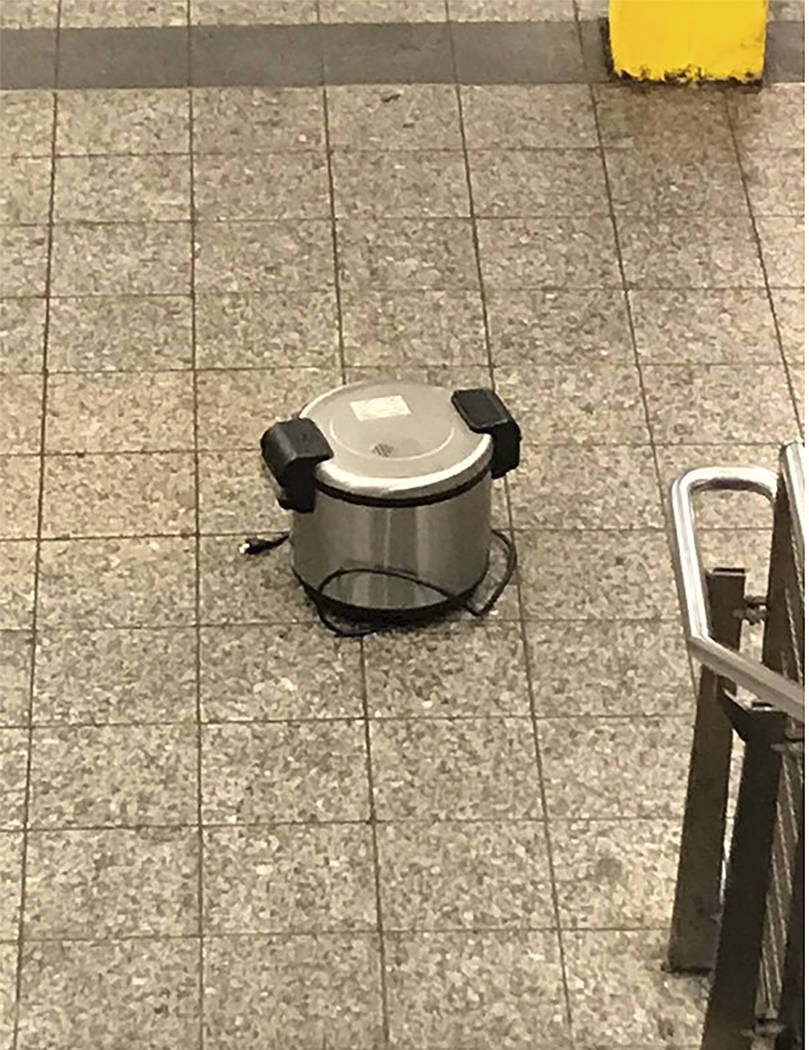 This photo provided by NYPD shows a suspicious object which looks like a pressure cooker or ele ...