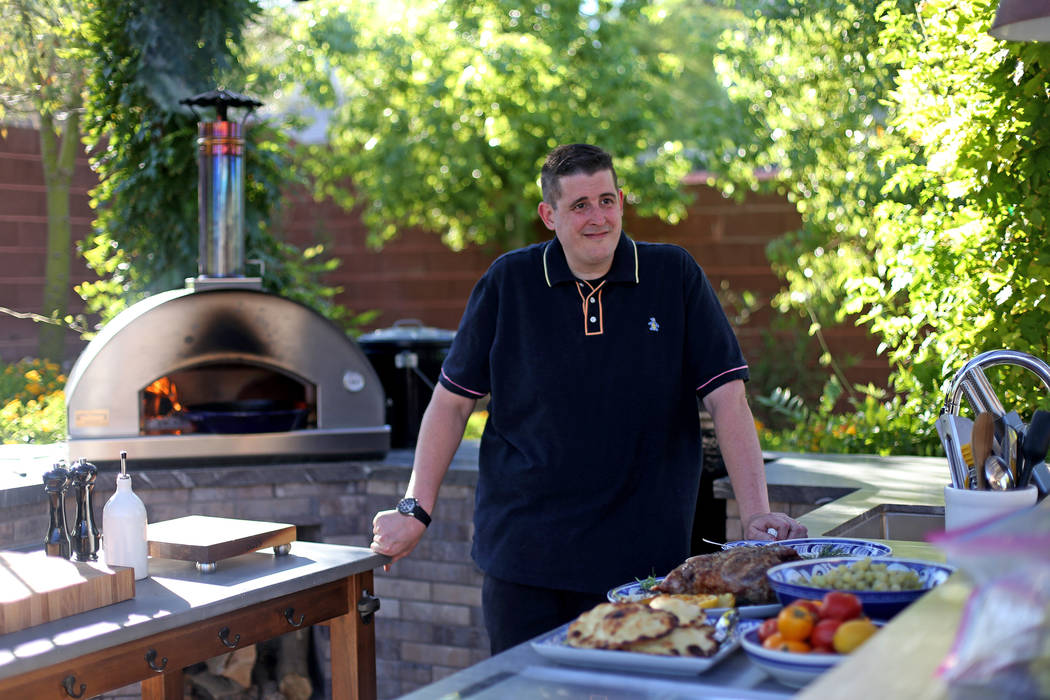 Matt Silverman, chef for HEXX Kitchen + Bar, in his backyard kitchen in Las Vegas, Wednesday, A ...
