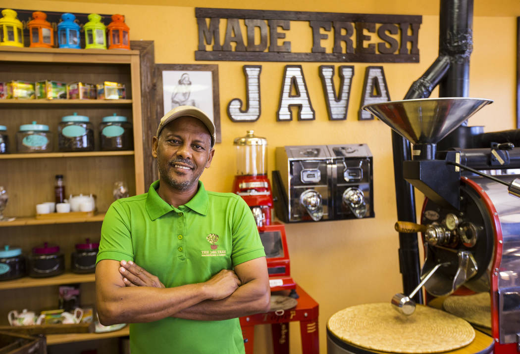 Solomon Teklu, owner of Java Tree, poses for a portrait his store at Flamingo Road and Decatur ...