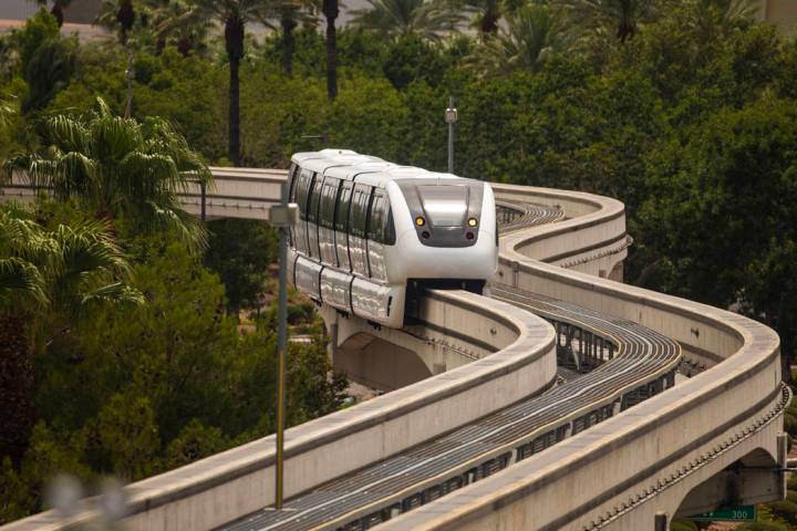 A train makes its way toward the SLS Station along the Las Vegas Monorail system on Sunday, Aug ...