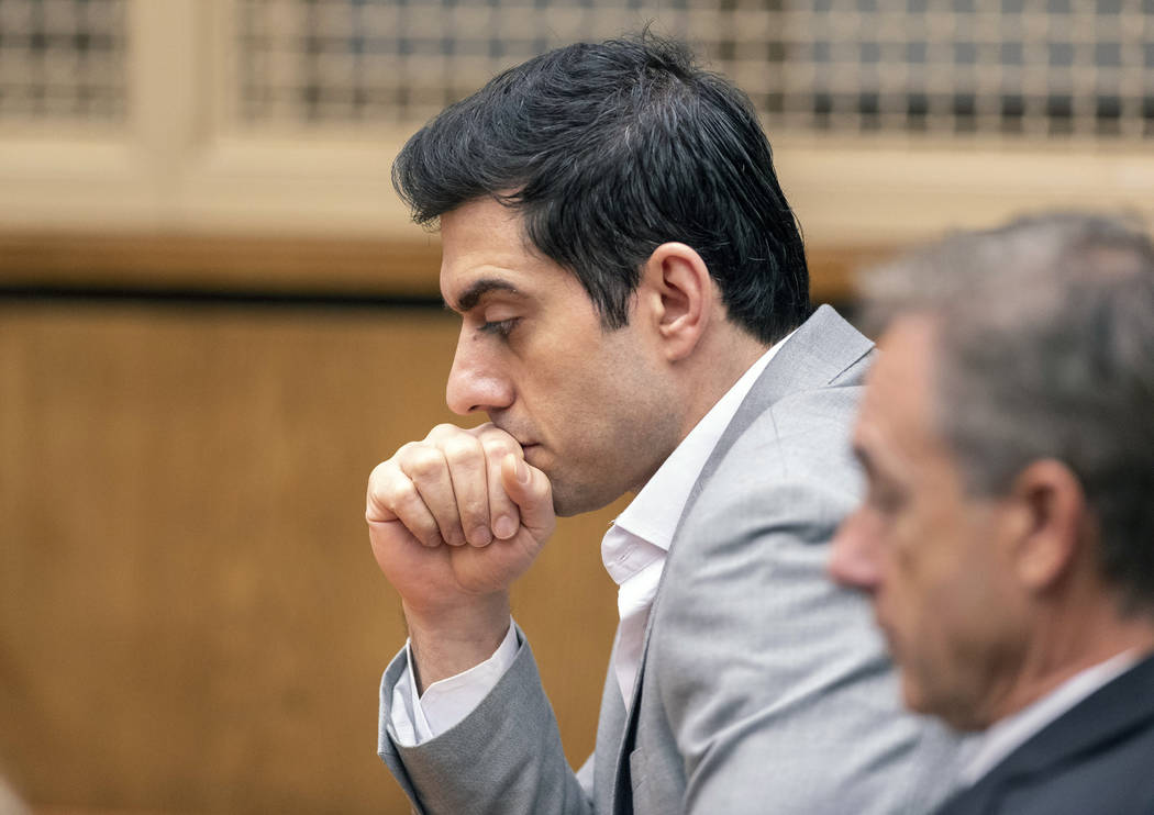 Defendant Hossein Nayeri listens to the judges' instructions before the reading of the verdict ...