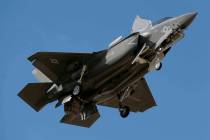 An F-35B fighter jet lands at Luke Air Force Base in this Tuesday, Dec. 10, 2013 file photo, in ...