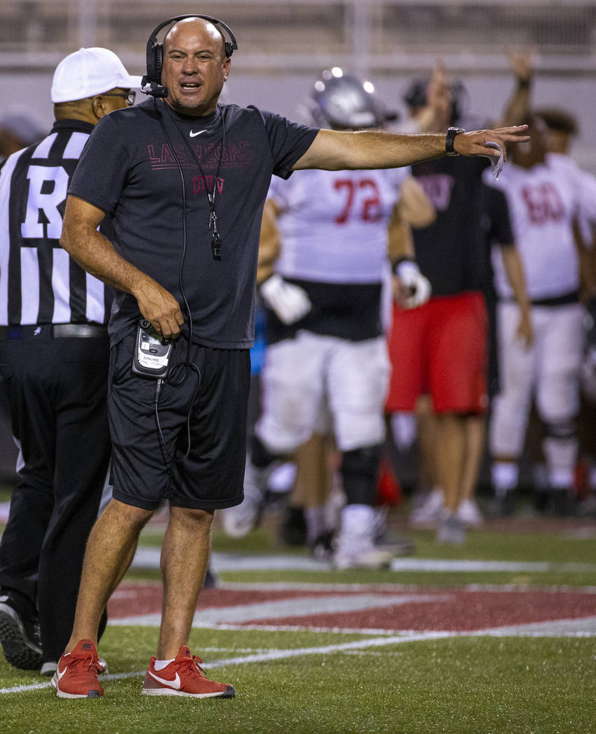 Head coach Tony Sanchez signals to the sidelines during the UNLV football team scrimmage at Sam ...