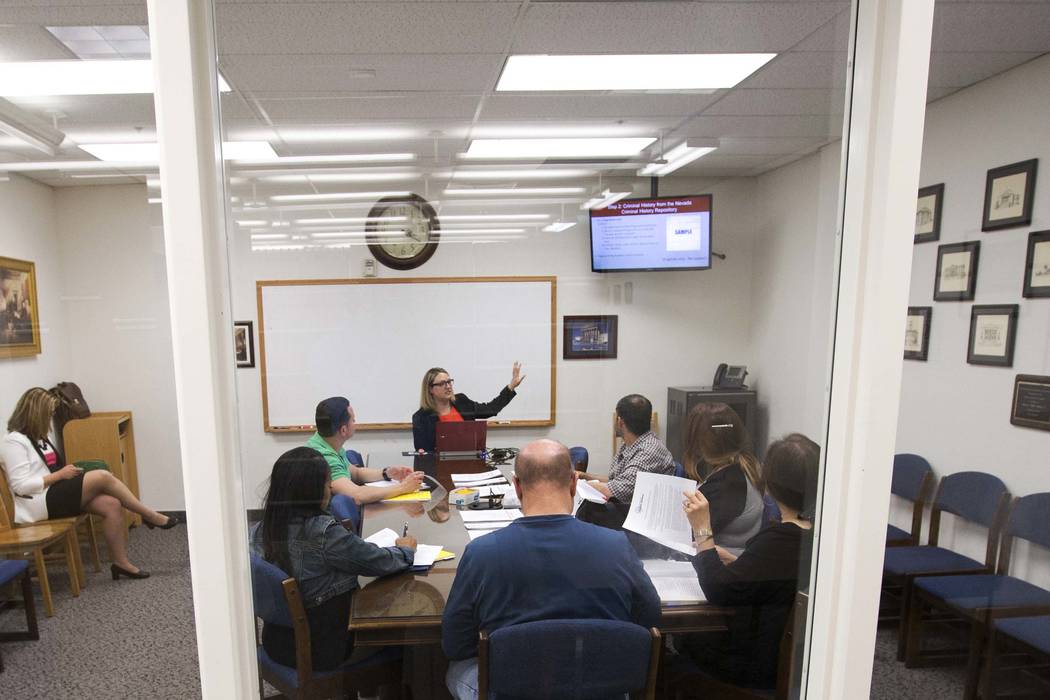 Kendra Jepsen, a law clerk with Equal Justice Works, leads a records sealing class at Clark Cou ...