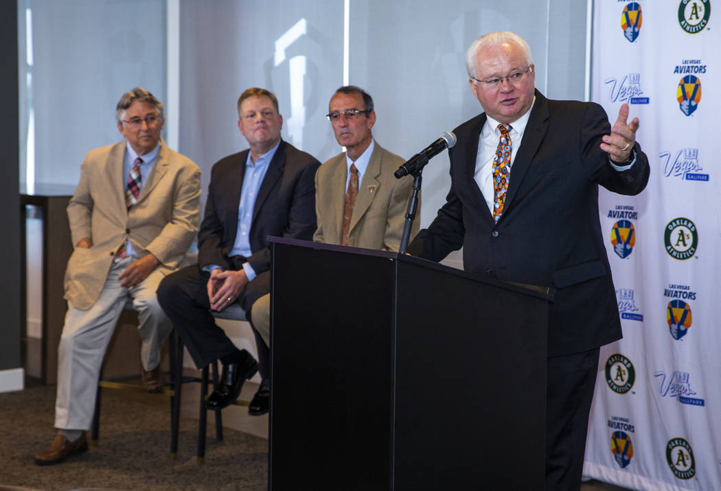 President of Minor League Baseball Pat O'Connor, right, speaks during a press conference announ ...