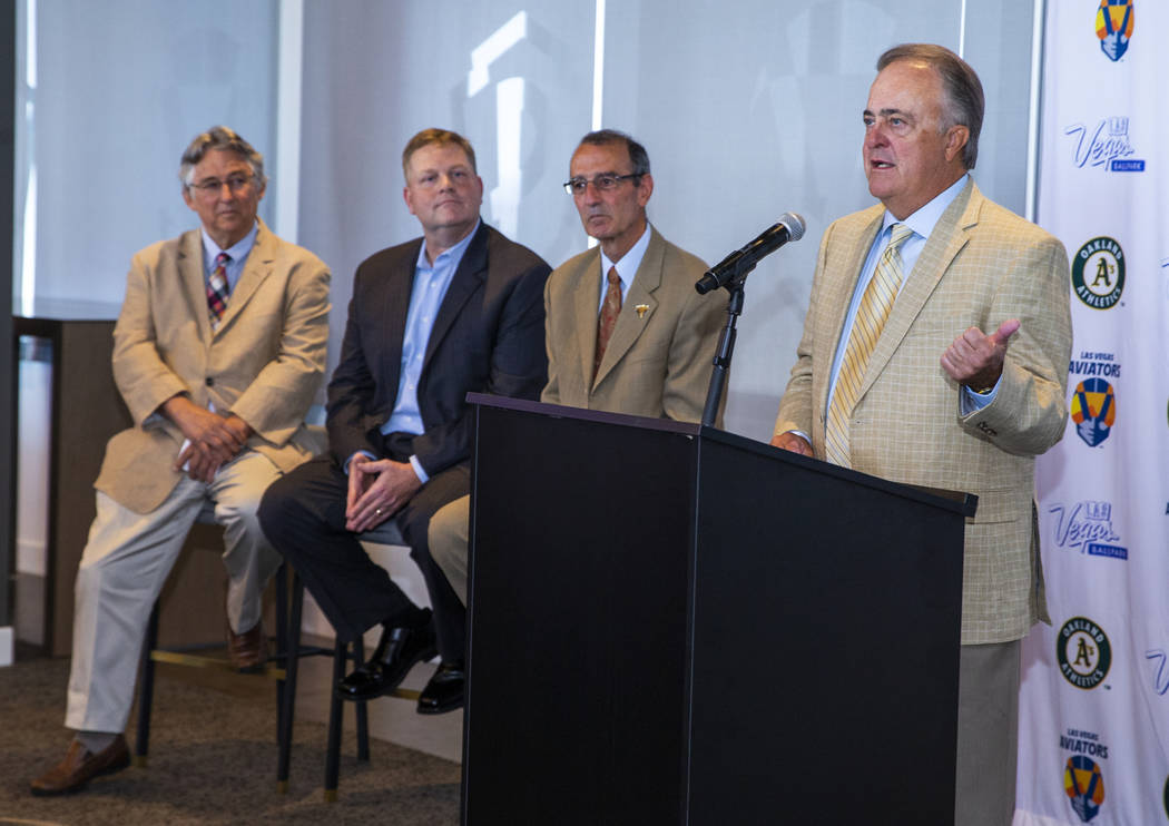 Aviators President/COO Don Logan, right, speaks during a press conference announcing the Las Ve ...