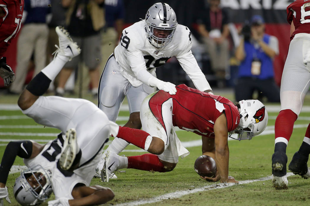 Arizona Cardinals quarterback Kyler Murray (1) is tackled in the end zone for a safety by by Oa ...