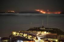 The fire on the mountains of the Canary Islands in this view taken from Santa Cruz de Tenerife ...