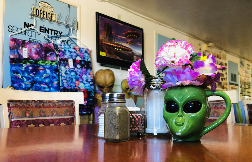 An alien mug is just one item amongst many depicting the creatures in the restaurant at the Lit ...