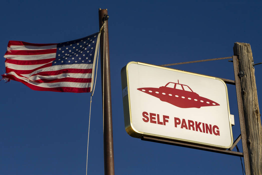 A UFO sign and American flag above the restaurant at the Little A'Le'Inn which is to be a gathe ...
