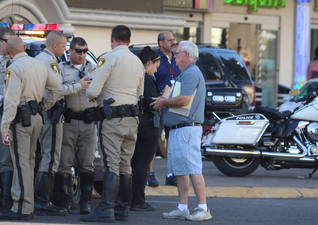 Las Vegas police are investigating after two pedestrians were injured, one critically, when the ...