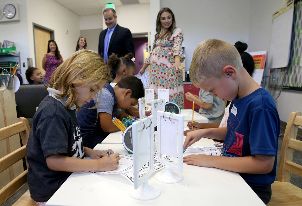 Wilhem DeSouza, left, and Mason Stiltner in Katie Rios' kindergarten class on the first day of ...