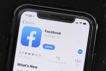 In a July 30, 2019, file photo, the social media application, Facebook is displayed on Apple's ...