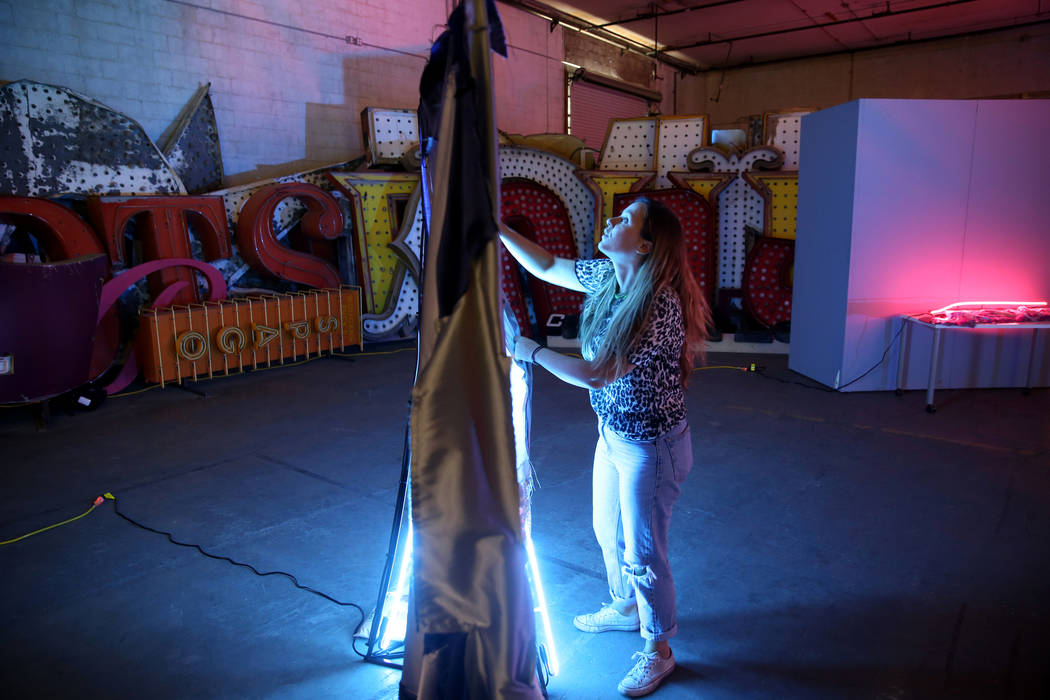 Julie Henson, artist in residence for the Neon Museum, works on one of her sculptures at the mu ...