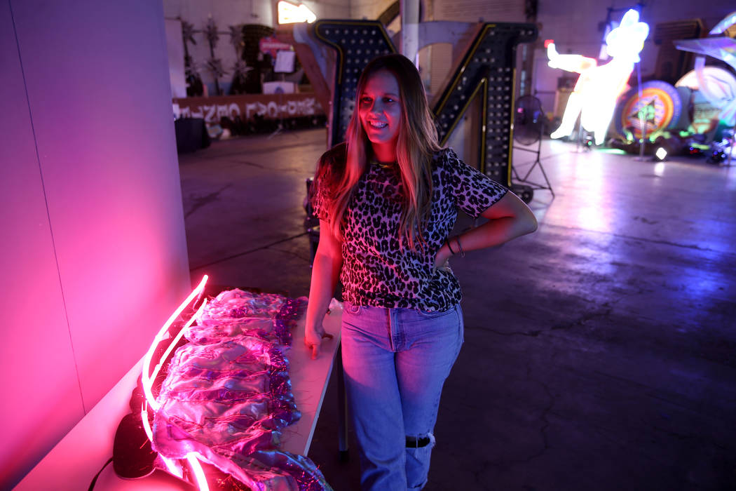 Julie Henson, artist in residence for the Neon Museum, works on one of her sculptures at the mu ...